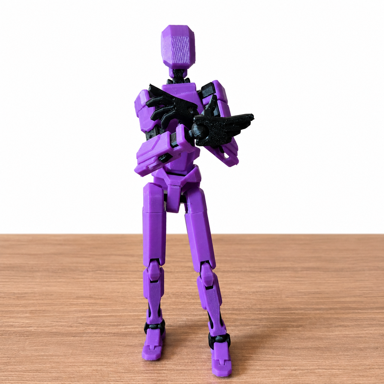 Dummy, boneco articulado roxo e preto impresso em 3D